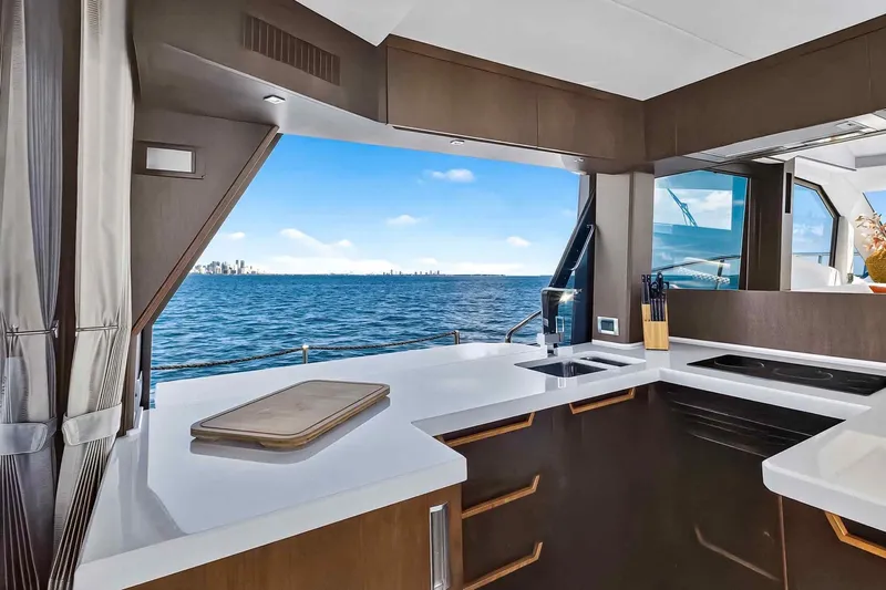 Mangogo Yacht Photos Pics Luxurious 2021 Galeon 500 Fly yacht kitchen with ocean view and modern design.
