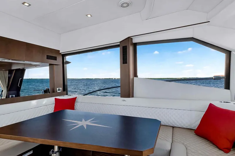 Mangogo Yacht Photos Pics Luxurious interior of 2021 Galeon 500 Fly yacht with ocean view and modern seating.