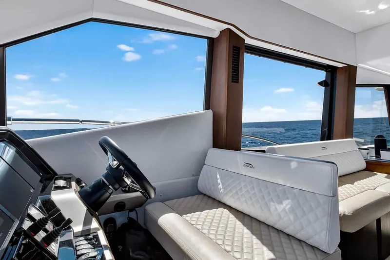 Mangogo Yacht Photos Pics Interior of 2021 Galeon 500 Fly yacht with luxurious seating and ocean view.