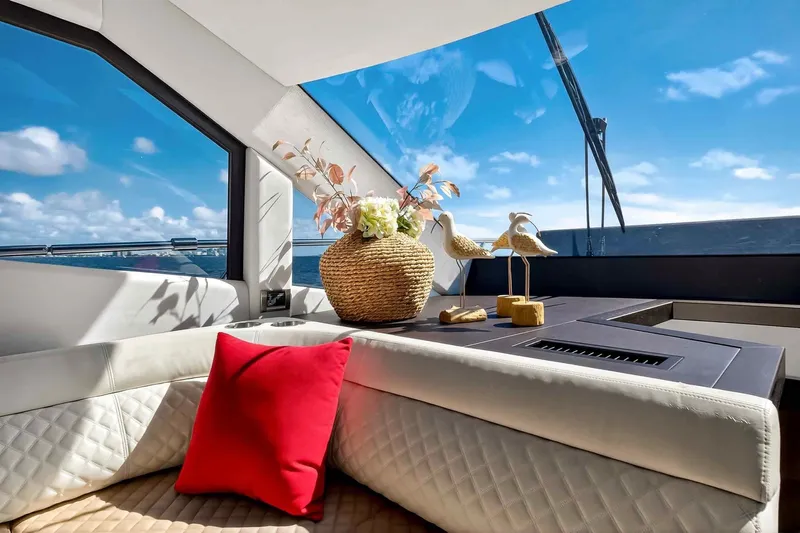 Mangogo Yacht Photos Pics Luxurious interior of 2021 Galeon 500 Fly yacht with elegant decor and ocean view.