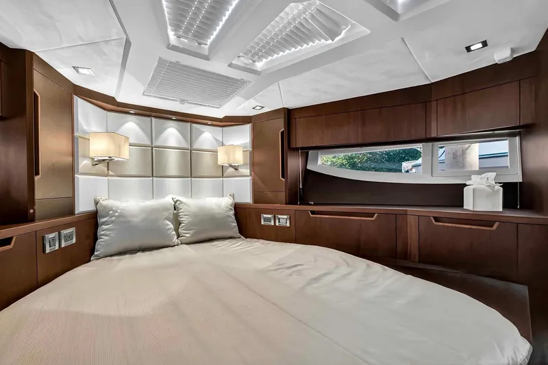 Mangogo Yacht Photos Pics Luxurious bedroom interior of 2021 Galeon 500 Fly yacht with modern design elements.