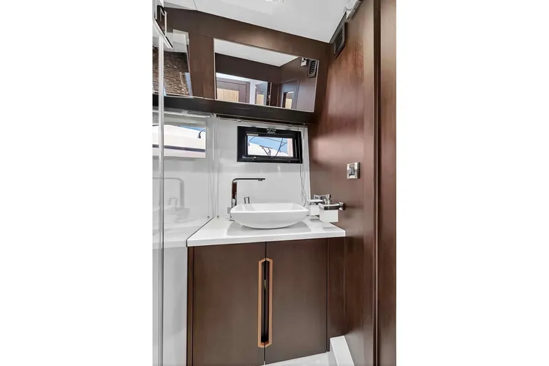 Mangogo Yacht Photos Pics Luxurious bathroom interior of 2021 Galeon 500 Fly yacht with modern fixtures.