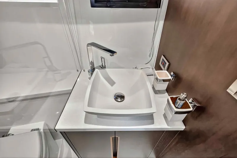 Mangogo Yacht Photos Pics Modern bathroom sink in 2021 Galeon 500 Fly yacht, featuring sleek design and fixtures.