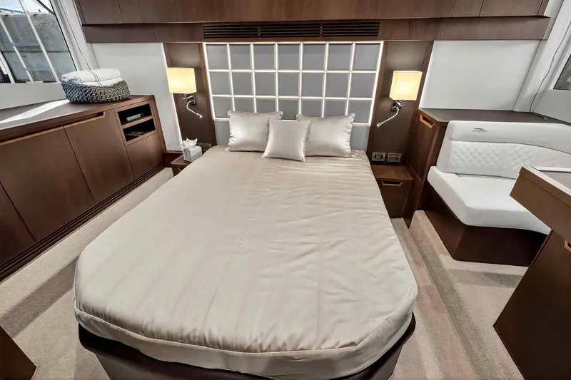 Mangogo Yacht Photos Pics Luxurious bedroom interior of 2021 Galeon 500 Fly yacht with elegant furnishings.