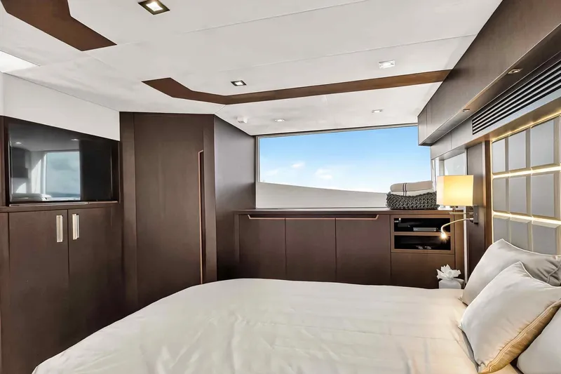 Mangogo Yacht Photos Pics Luxurious bedroom interior of 2021 Galeon 500 Fly yacht with modern design elements.