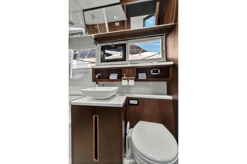 Mangogo Yacht Photos Pics Luxurious bathroom interior of 2021 Galeon 500 Fly yacht, featuring modern fixtures and elegant design.
