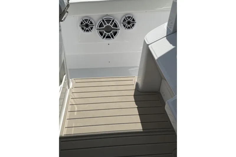  Yacht Photos Pics 2024 Bertram 39 CC boat deck with speakers and seating area.