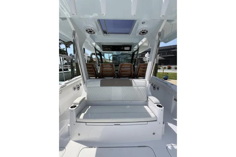  Yacht Photos Pics 2024 Bertram 39 CC boat interior with seating and modern design features.