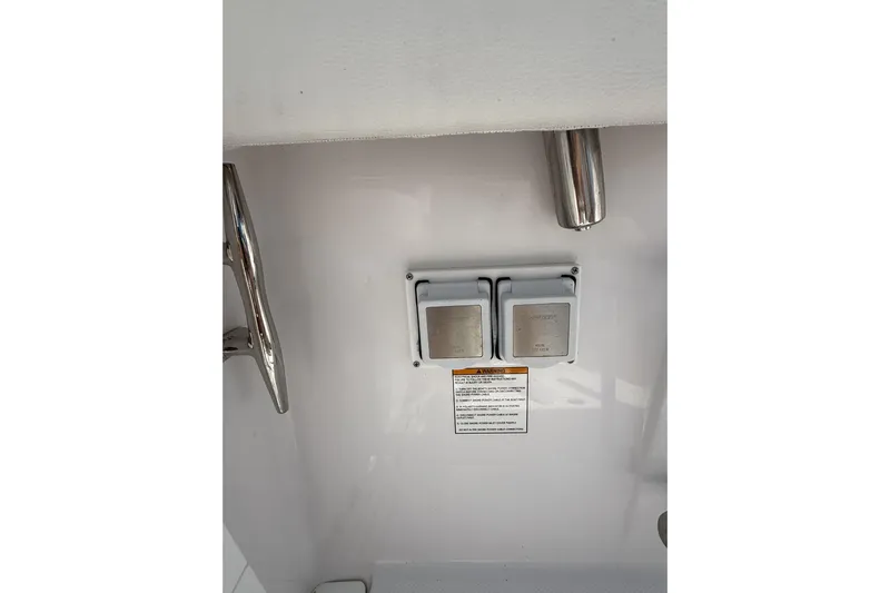  Yacht Photos Pics Electrical outlets on 2024 Bertram 39 CC boat with stainless steel fixtures.
