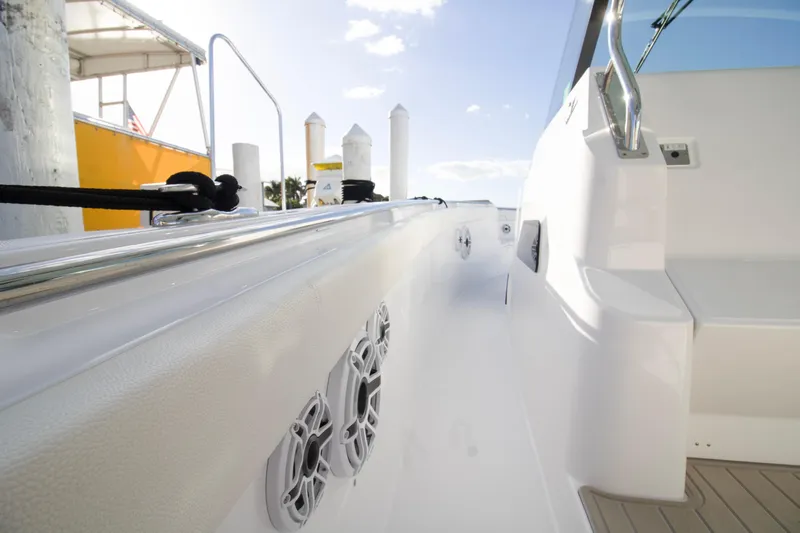  Yacht Photos Pics 2024 Bertram 39 CC boat deck with sleek white finish and modern design.