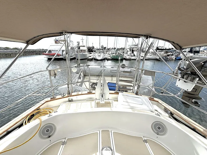 Sarah Yacht Photos Pics Cabo Rico Pearl Edition Anniversary Special yacht, 2000 model, docked in a marina.