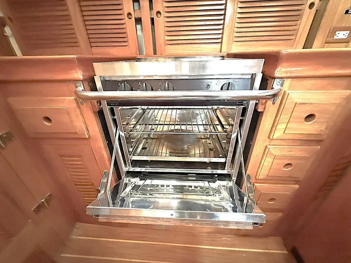 Sarah Yacht Photos Pics Stainless steel oven in a 2000 Cabo Rico Pearl Edition yacht kitchen.
