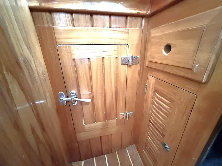Sarah Yacht Photos Pics Wooden cabinetry inside 2000 Cabo Rico Pearl Edition Anniversary Special yacht.