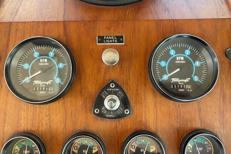  Yacht Photos Pics Dashboard of a 1981 Tollycraft 48 Motor Yacht with RPM gauges and panel lights.