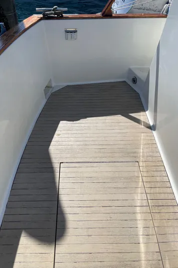  Yacht Photos Pics 1981 Tollycraft 48 Motor Yacht deck with wooden flooring.