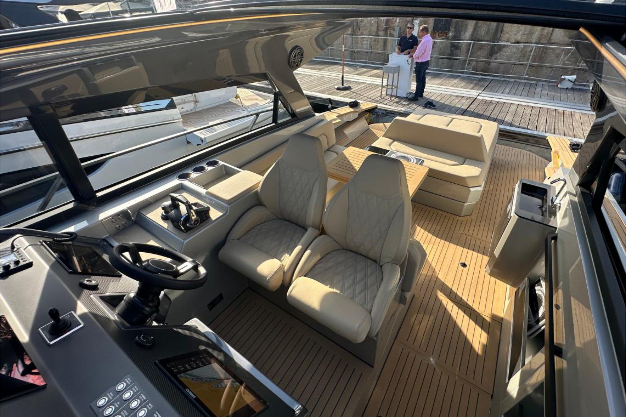 Luxurious 2025 Focus 3X yacht interior with plush seating and modern helm controls.