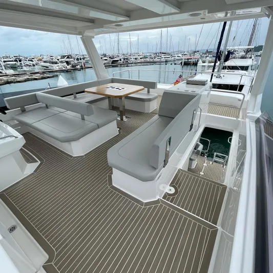 Leopard 40pc Yacht Photos Pics Spacious deck of 2025 Leopard 40PC yacht with modern seating and marina view.