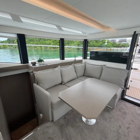 Leopard 40pc Yacht Photos Pics Luxurious interior of 2025 Leopard 40PC yacht with plush seating and scenic water views.