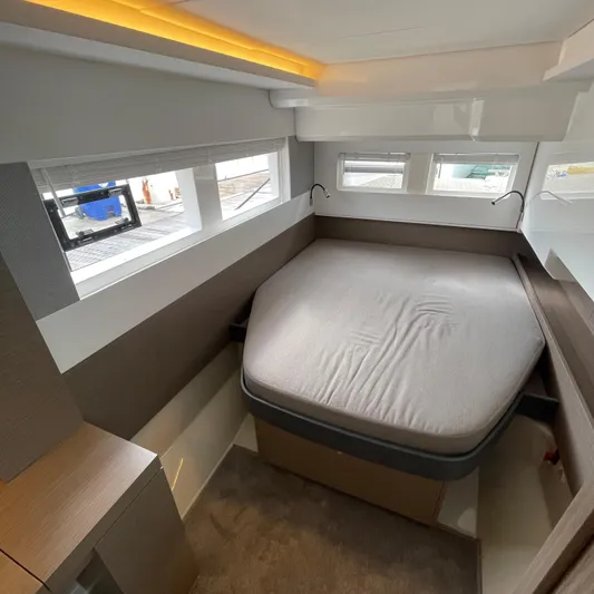 Leopard 40pc Yacht Photos Pics Cozy bedroom interior of 2025 Leopard 40PC yacht with modern design and ample natural light.