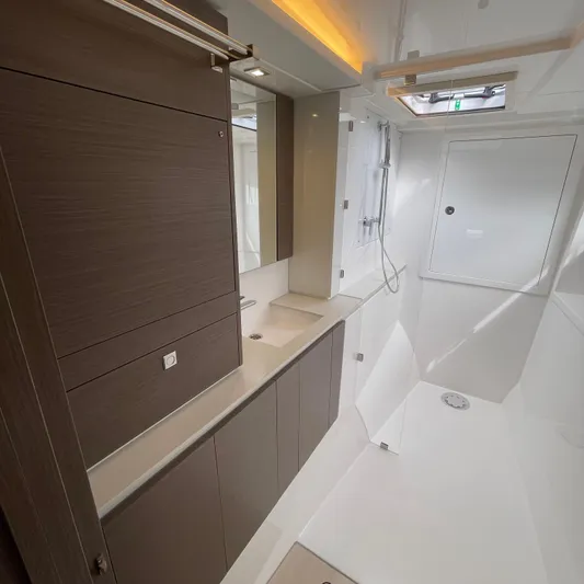 Leopard 40pc Yacht Photos Pics Modern bathroom interior of 2025 Leopard 40PC yacht, featuring sleek cabinetry and shower.
