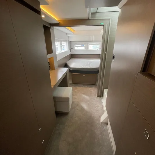 Leopard 40pc Yacht Photos Pics Luxurious interior of 2025 Leopard 40PC yacht with modern furnishings and cozy bedroom.