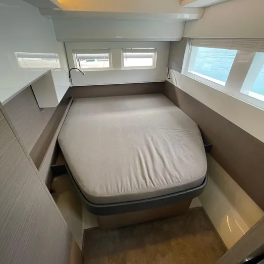 Leopard 40pc Yacht Photos Pics Cozy bedroom interior of 2025 Leopard 40PC yacht with modern design and natural light.