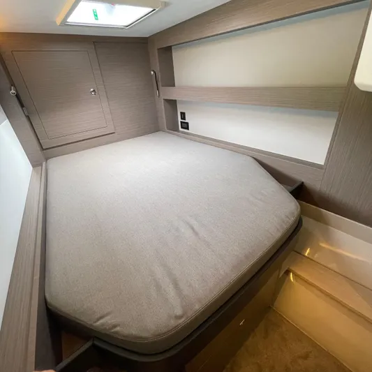 Leopard 40pc Yacht Photos Pics 2025 Leopard 40PC cabin interior with a cozy bed and modern design.