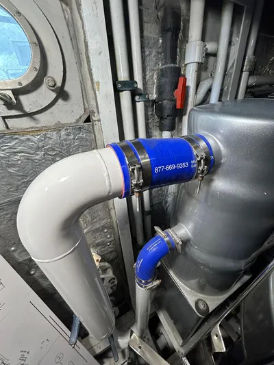 1992/2016 Heesen Motor Yacht Yacht Photos Pics Engine room piping in a 1992 Heesen 141 Motor Yacht, featuring blue and white connectors.