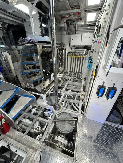 1992/2016 Heesen Motor Yacht Yacht Photos Pics Engine room of 1992 Heesen 141 Motor Yacht with complex machinery and control panels.