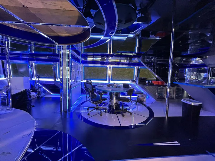 1992/2016 Heesen Motor Yacht Yacht Photos Pics Luxurious interior of 1992 Heesen 141 Motor Yacht with modern blue lighting and sleek design.