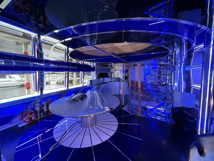 1992/2016 Heesen Motor Yacht Yacht Photos Pics Luxurious interior of 1992 Heesen 141 Motor Yacht with modern blue lighting and sleek design.