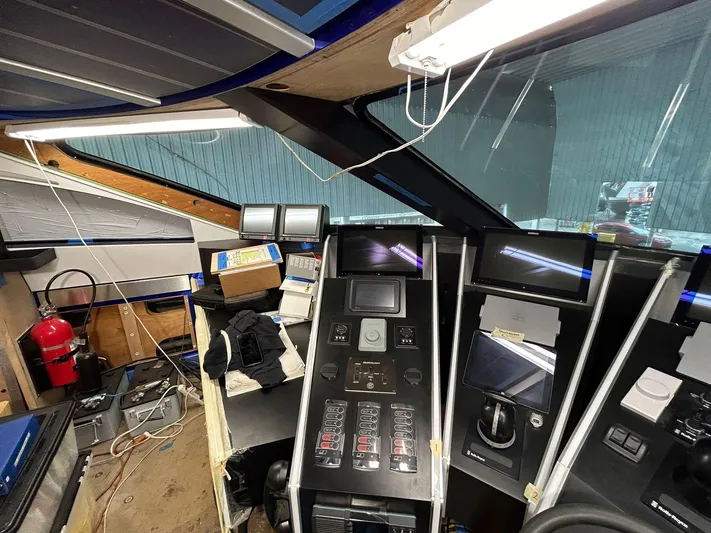 1992/2016 Heesen Motor Yacht Yacht Photos Pics Control panel of a 1992 Heesen 141 Motor Yacht, featuring navigation and communication equipment.