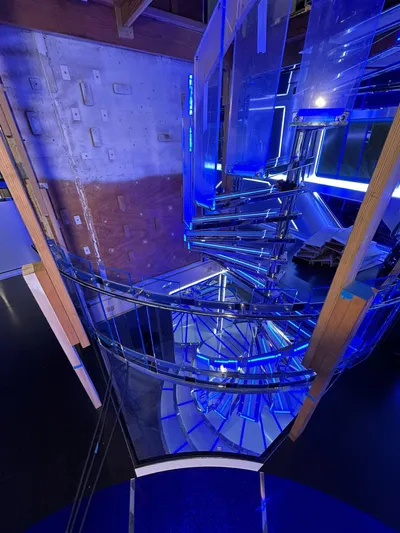 1992/2016 Heesen Motor Yacht Yacht Photos Pics Spiral staircase with blue lighting inside a 1992 Heesen 141 Motor Yacht.