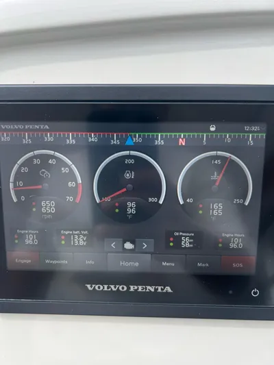 Saviour Yacht Photos Pics Volvo Penta engine display on Evolve 400HT, 2022 model, showing RPM and temperature gauges.