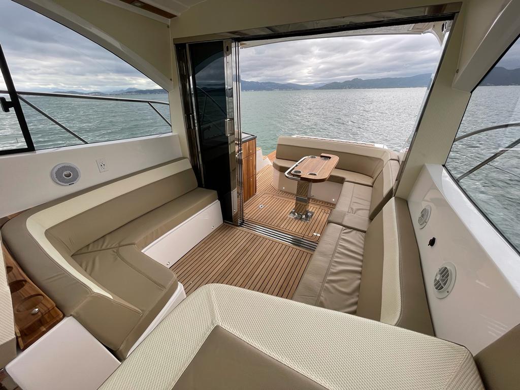 Luxurious interior of 2022 Evolve 400HT yacht with scenic ocean view.