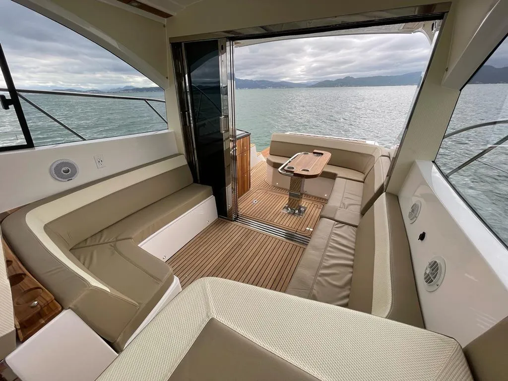 Luxurious interior of 2022 Evolve 400HT yacht with scenic ocean view.