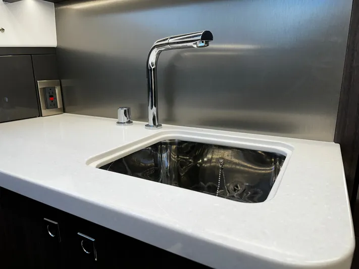  Yacht Photos Pics Modern kitchen sink with sleek faucet in 2024 Galeon 435 GTO yacht.
