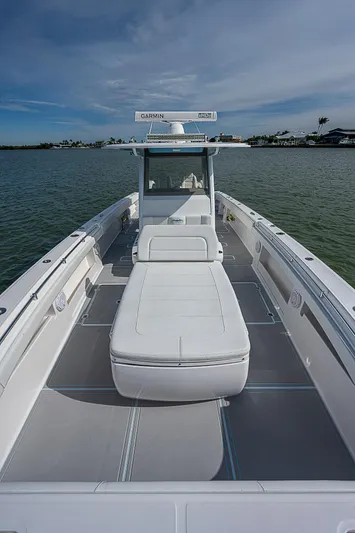  Yacht Photos Pics 2020 Invincible 37 Catamaran on water, featuring spacious deck and modern design.