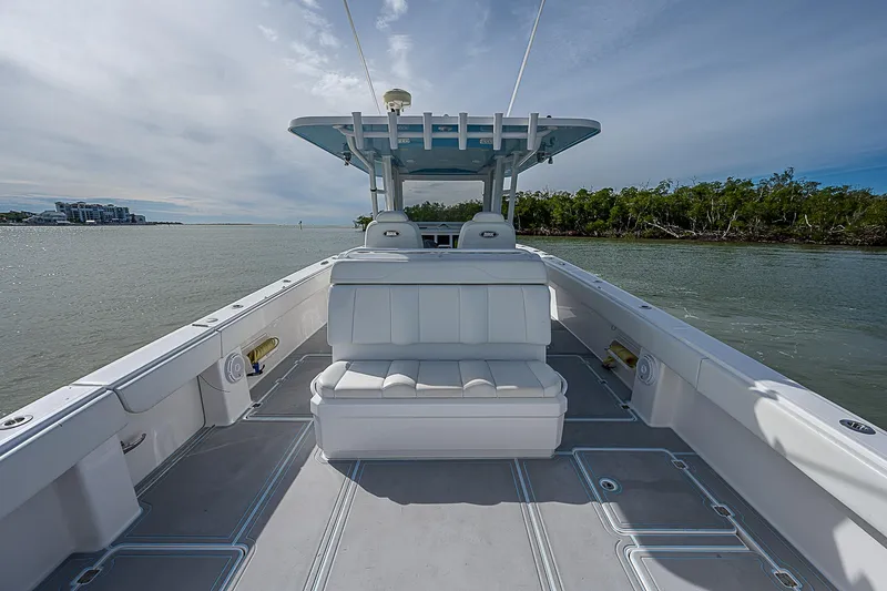  Yacht Photos Pics Invincible 37 Catamaran 2020 on calm waters, featuring spacious seating and sleek design.