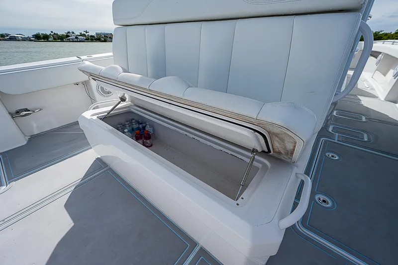  Yacht Photos Pics Open storage compartment on 2020 Invincible 37 Catamaran with drinks inside.