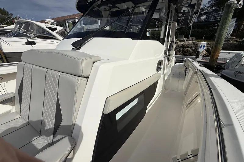 Alroma Yacht Photos Pics 2022 Pursuit S 358 Sport boat with sleek design and comfortable seating.