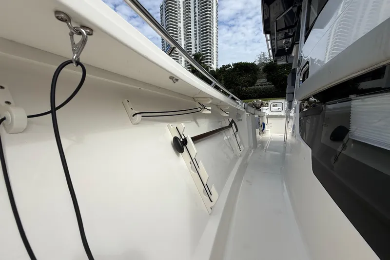 Alroma Yacht Photos Pics 2022 Pursuit S 358 Sport boat interior with sleek design and modern features.