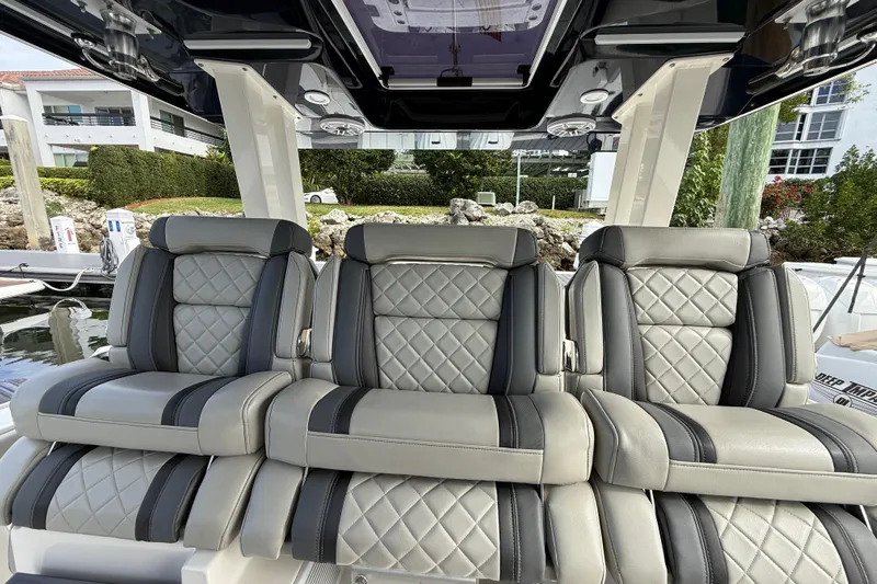 Alroma Yacht Photos Pics Luxurious seating on 2022 Pursuit S 358 Sport boat, featuring quilted leather upholstery.