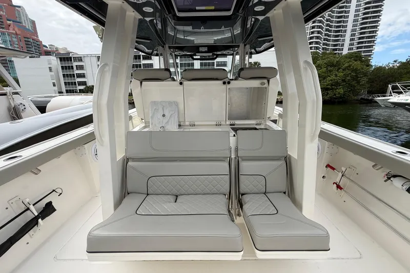 Alroma Yacht Photos Pics 2022 Pursuit S 358 Sport boat interior with gray seating and modern design.
