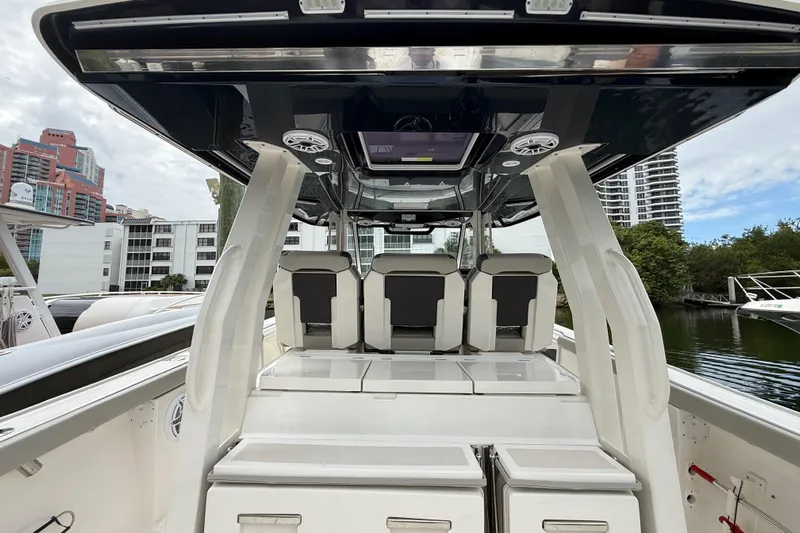 Alroma Yacht Photos Pics 2022 Pursuit S 358 Sport boat interior with modern seating and sleek design.