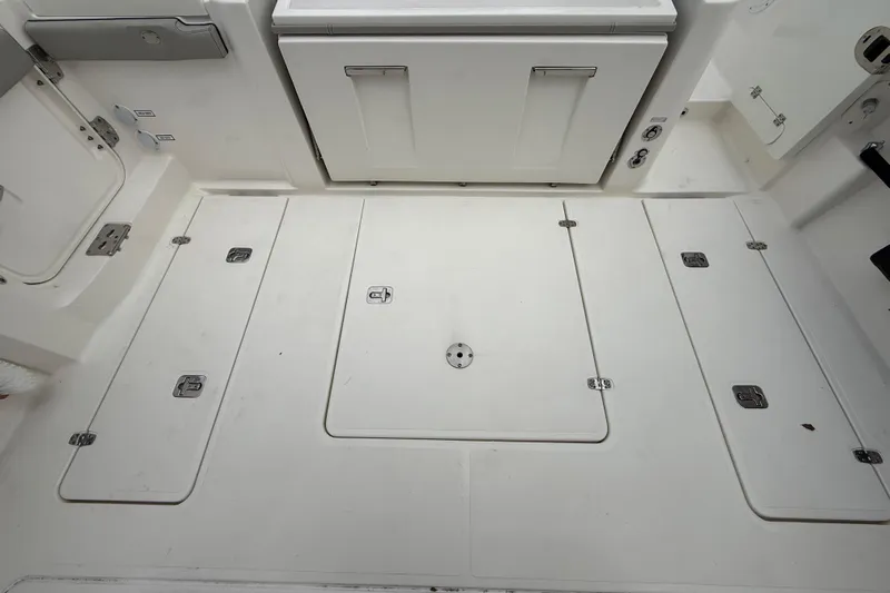 Alroma Yacht Photos Pics 2022 Pursuit S 358 Sport boat deck with storage compartments.