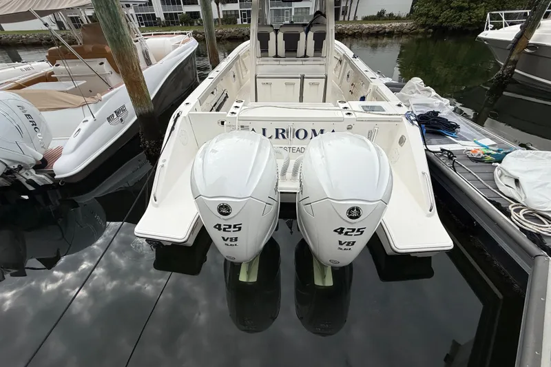 Alroma Yacht Photos Pics 2022 Pursuit S 358 Sport boat with twin 425 V8 engines docked in marina.