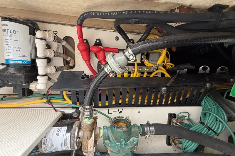 Alroma Yacht Photos Pics Engine compartment of 2022 Pursuit S 358 Sport with wiring and components.