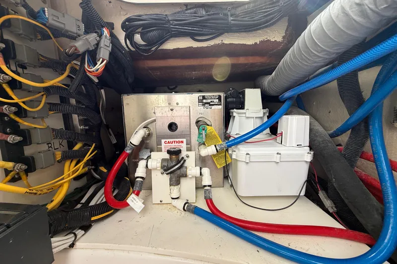 Alroma Yacht Photos Pics Electrical and plumbing system inside 2022 Pursuit S 358 Sport boat.