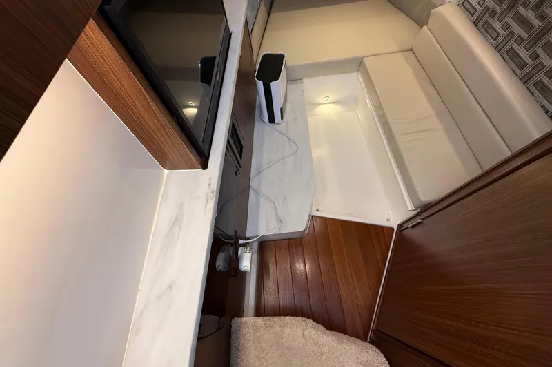 Alroma Yacht Photos Pics 2022 Pursuit S 358 Sport interior with modern wood and leather finishes.
